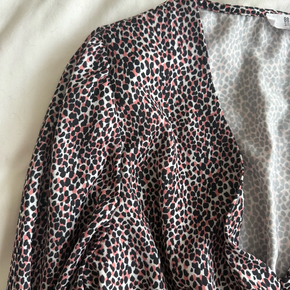 Cheetah Print Peplum Long Sleeve Blouse - Picture 7 of 10